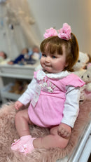 Bebê Reborn Maddie Corpo de Tecido e Membros de Silicone 53 cm - Enxoval Completo