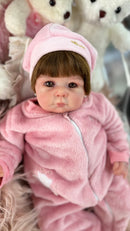 Bebê Reborn Hanna Realista com Corpo de Tecido e Cabelinho Cheio - Enxoval Completo