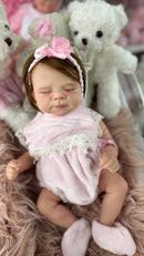 Bebê Reborn Marjorie Premium Realista com Corpo de Tecido e Membros de Silicone - Enxoval Completo