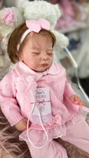 Bebê Reborn Laurinha Premium com Corpo de Tecido e Enxoval Completo