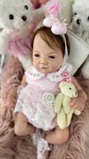 Bebê Reborn Maria Laura Premium com Corpo de Tecido - Enxoval Completo