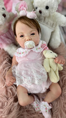 Bebê Reborn Maria Laura Premium com Corpo de Tecido - Enxoval Completo